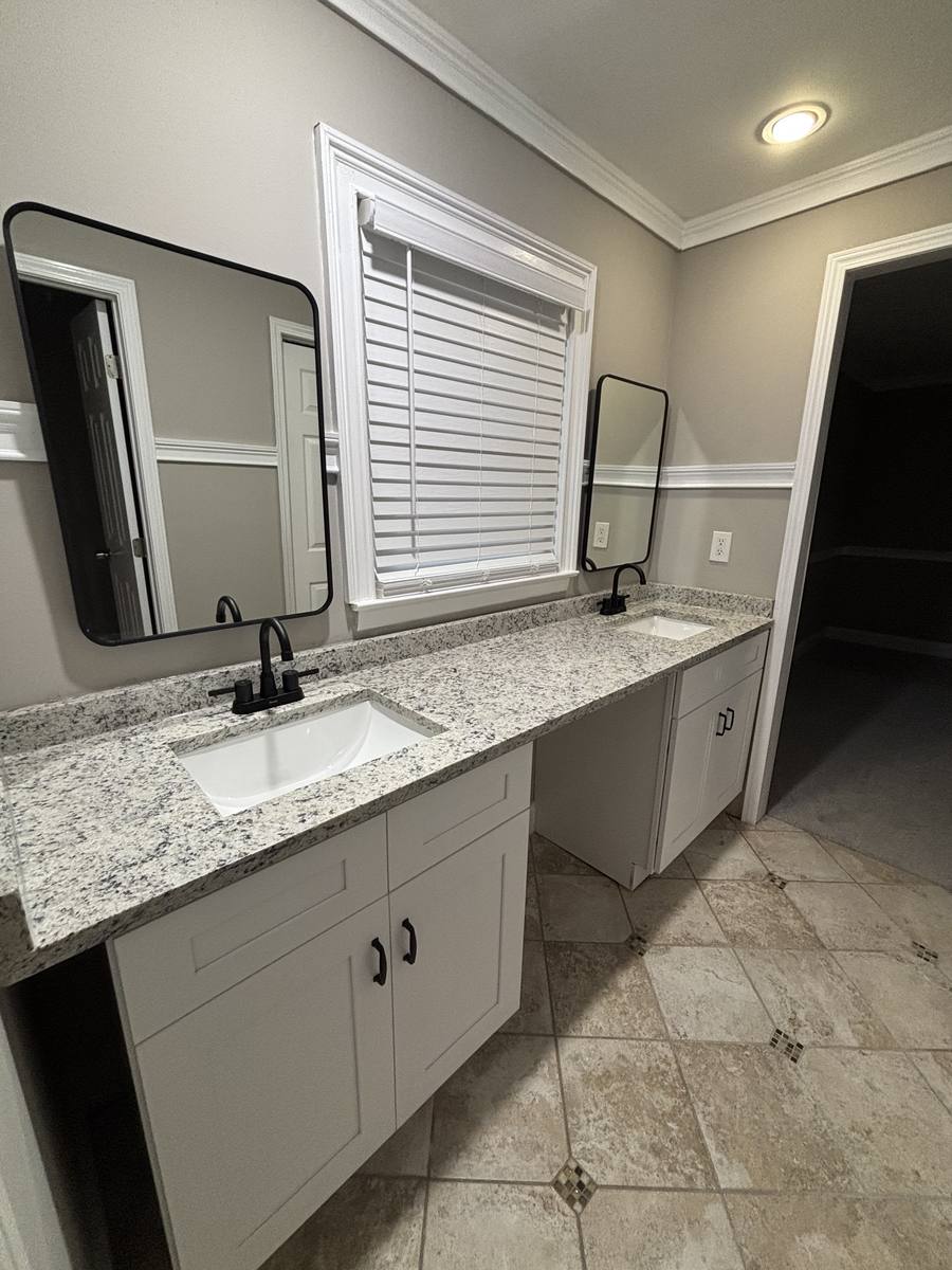 Baño con tocador de granito